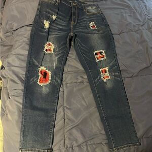 Boutique close out! Buffalo plaid patch skinny jeans.